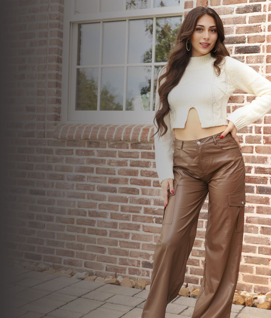 Mobile image of woman wearing avenue des champs outfit, Sure to Impress Faux Leather Cargo Pants, standing next to a brick wall